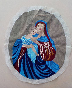 Borduurwerk met afbeelding van Maria en Jezus